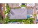 Aerial view of the property, showcasing the pool, landscaping, and roof at 310 8Th N Ave, St Petersburg, FL 33701