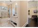 Bathroom with granite counters, bath and shower and decorative tiled wall at 310 8Th N Ave, St Petersburg, FL 33701