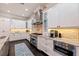 Well-equipped kitchen with stainless steel appliances, custom cabinetry, and ample counter space at 310 8Th N Ave, St Petersburg, FL 33701