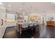Open-concept kitchen featuring an island, stainless steel appliances, and custom cabinetry at 310 8Th N Ave, St Petersburg, FL 33701
