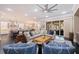 Open living space with stylish furnishings, dark wood floors, and a seamless flow to the outdoor patio at 310 8Th N Ave, St Petersburg, FL 33701