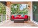 A covered patio with a seating area, perfect for enjoying the outdoors at 310 8Th N Ave, St Petersburg, FL 33701