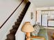 Interior shot featuring staircase and view of the kitchen at 4352 Tahitian Gardens Cir # E, Holiday, FL 34691