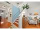 Hallway with beach themed decor and bright lighting at 458 Grant St, Dunedin, FL 34698