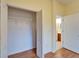 Walk-in closet with rod for storage, and access to the en-suite bathroom at 1950 Sterling Glen Ct, Sun City Center, FL 33573
