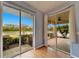 Patio view with large sliding glass doors, offering a seamless transition between indoor and outdoor living at 1950 Sterling Glen Ct, Sun City Center, FL 33573