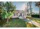 Charming single-Gathering home featuring a well-manicured lawn and a welcoming front porch at 4056 18Th S Ave, St Petersburg, FL 33711