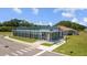Exterior view of a modern nature center with a welcoming entrance and ample parking at 4154 Pinelake Ln # 101, Tampa, FL 33618