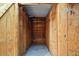 A wooden storage area offers ample space for belongings and tools at 4154 Pinelake Ln # 101, Tampa, FL 33618