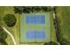 Overhead shot of community tennis courts, perfect for active recreation and sports at 4154 Pinelake Ln # 101, Tampa, FL 33618