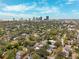 Aerial view of a neighborhood with a cityscape in the background at 832 13Th N Ave, St Petersburg, FL 33701