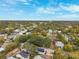 An aerial view of a neighborhood highlighting the residential architecture and tree-lined streets at 832 13Th N Ave, St Petersburg, FL 33701