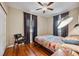Bedroom featuring hardwood floors, large windows, decoratively furnished at 832 13Th N Ave, St Petersburg, FL 33701