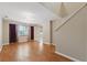 Open living room with hardwood floors, neutral paint, recessed lighting, and natural light from the windows at 832 13Th N Ave, St Petersburg, FL 33701