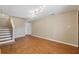 Spacious room featuring hardwood floors, recessed lighting, and neutral paint, creating a blank canvas at 832 13Th N Ave, St Petersburg, FL 33701