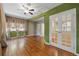 Spacious living room with hardwood floors, lots of natural light, and textured walls at 832 13Th N Ave, St Petersburg, FL 33701