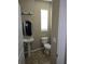 Half bathroom with pedestal sink, ceramic tile floor, and neutral paint at 6769 Breezy Palm Dr, Riverview, FL 33578