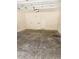 Spacious two car garage with bright lighting and access door at 6769 Breezy Palm Dr, Riverview, FL 33578
