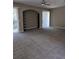 Open living room area featuring neutral paint, carpet and built-in shelving detail at 6769 Breezy Palm Dr, Riverview, FL 33578