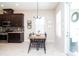 Bright dining area next to the kitchen with modern furniture and stylish decor at 11125 Winthrop Lake Dr, Riverview, FL 33578