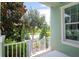 Inviting front porch with a view of the neighborhood at 11125 Winthrop Lake Dr, Riverview, FL 33578
