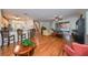 Spacious living room with hardwood floors and an open floor plan at 12127 Luftburrow Ln, Hudson, FL 34669