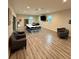 Spacious room for meetings and activities features several windows, comfortable chairs, and a television at 12127 Luftburrow Ln, Hudson, FL 34669