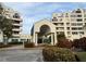Exterior view of a condominium building with a covered entrance at 2333 Feather Sound Dr # B301, Clearwater, FL 33762