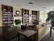 Lobby featuring cozy seating area with bookshelves and fireplace at 2333 Feather Sound Dr # B301, Clearwater, FL 33762