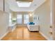 Bright office space with natural light, skylight, and hardwood floors; ideal for productivity at 4845 W Sunset Blvd, Tampa, FL 33629