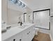 The stylish bathroom has a tub and modern fixtures for comfortable and luxurious living at 7537 Bayshore Dr # 406, Treasure Island, FL 33706