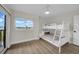 Bedroom offers natural light with a bunk bed, creating a cozy and functional space at 7537 Bayshore Dr # 406, Treasure Island, FL 33706