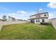 A spacious, fenced-in backyard offers plenty of room for outdoor activities and recreation at 14786 Horse Trot Rd, Lithia, FL 33547
