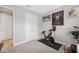 Exercise room with workout equipment and closet at 14786 Horse Trot Rd, Lithia, FL 33547