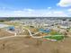 Community park featuring a playground, pickleball court, greenspace, and walking paths at 14786 Horse Trot Rd, Lithia, FL 33547