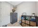 The spare room features a gray safe, deer mount, and a stylish storage cube with woven baskets at 14786 Horse Trot Rd, Lithia, FL 33547