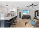 Stylish kitchen with white cabinets, stainless steel appliances, and an island with barstool seating at 4420 Pompano Se Dr, St Petersburg, FL 33705