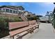 The dock features seating and boat parking with a view of the beautiful waterfront home at 861 Symphony Isles Blvd, Apollo Beach, FL 33572