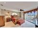 Spacious main bedroom with a decorative bed and access to a balcony at 861 Symphony Isles Blvd, Apollo Beach, FL 33572