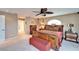 Bright main bedroom featuring a decorative bed and classic furniture at 861 Symphony Isles Blvd, Apollo Beach, FL 33572