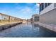 A soothing water feature enhances the outdoor living space, creating a serene and luxurious atmosphere at 861 Symphony Isles Blvd, Apollo Beach, FL 33572