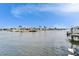 The beautiful, unobstructed waterfront view showcases the community's deep sailboat water and boating lifestyle at 861 Symphony Isles Blvd, Apollo Beach, FL 33572