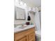 Light filled bathroom with tile flooring, a wood vanity, and a shower-tub combination at 2506 N Rocky Point Dr # 272, Tampa, FL 33607