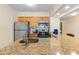 An open kitchen features stainless steel appliances and granite countertops at 2506 N Rocky Point Dr # 272, Tampa, FL 33607