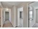 Hallway with a carpet floor at 6834 Blue Moon Way, Sun City Center, FL 33573