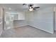 Spacious loft area with carpeting and a ceiling fan at 6834 Blue Moon Way, Sun City Center, FL 33573
