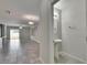 Half bathroom featuring pedestal sink and modern lighting fixtures at 6834 Blue Moon Way, Sun City Center, FL 33573