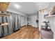 Spacious basement featuring durable wood look flooring and ample storage space at 11001 Hobson St, Spring Hill, FL 34608