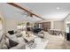Open-concept living space with a kitchen, dining area, and sliding glass doors to the outdoors at 11001 Hobson St, Spring Hill, FL 34608
