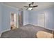 Spacious bedroom with ensuite bath, closet, and natural light creates a comfortable retreat at 2160 Chianti Pl # 11-0117, Palm Harbor, FL 34683